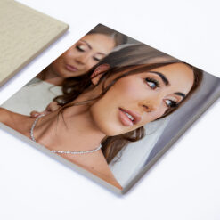 Ceramic tile with photo of wedding bride on the front.